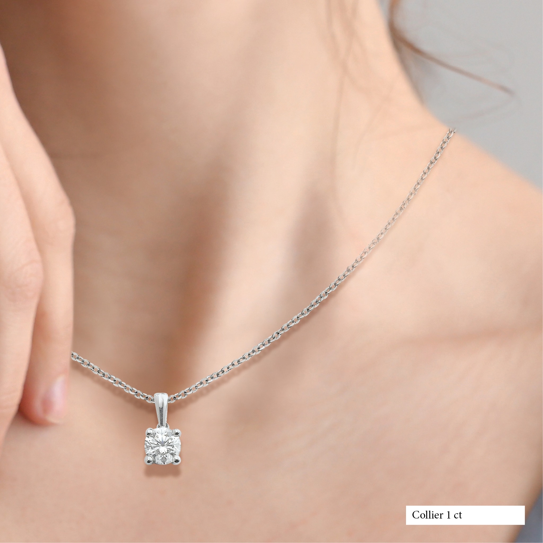 Pendentif 4 griffes - 1 carat